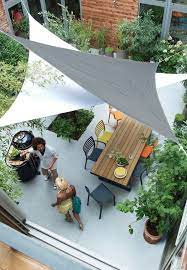 Simple Summer Style 10 Garden Ideas For A Backyard Canopy Gardenista Backyard Shade Patio Patio Shade