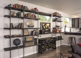 My son, a little engineer in the making needed a computer desk all the pipe components used for the building of this desk are ¾ black steel which didn't need additional paint. Diy Industrial Pipe Shelving On A Reasonable Budget Diy Candy