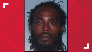 Phoenix police release edited video of officers shooting, killing armed man  who was holding a baby