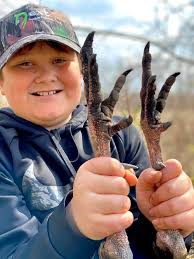 Steve Akright and his son Sam with his first turkey! Greg Francis was happy  to only be hunting a field away to take the pics for the special moment!  Let's see your