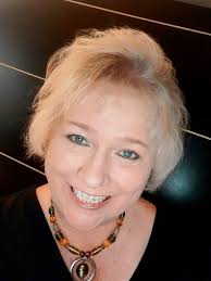 Ricky and Archer lounging in the grass.