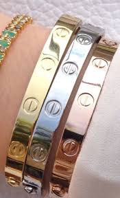 Cartier Love Bracelet Your Partner Puts It On And Locks It They Hold The Key Designed To Be Opene Love Bracelets Cartier Love Bracelet Cartier Nail Bracelet