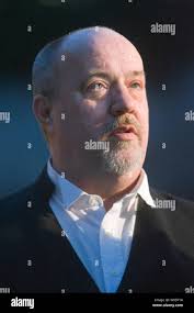 Crown prosecutor Mike Petrie talks to reporters during a break between the  reading of impact statements by the relatives of victims of serial killer  Robert Pickton and the sentencing of Pickton by