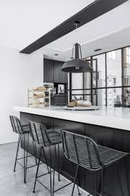 It is 44″ to the top of the back. Rattan Bar Stool Black 89x43x50cm House Of Orange