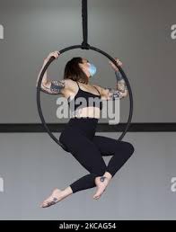 Ariel dancer Lindsay Maxfield rehearses in a surgical mask in her studio in  Houston, Texas