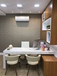 The wooden shelves hang nicely above the desk, allowing you to store and grab important files in a jiffy. Archiparti International Limited Office Cabin Design Medical Office Furniture Small Office Design Interior
