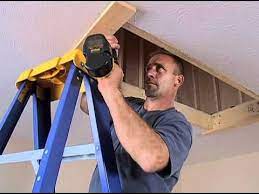 Wood Attic Ladder Long Installation Video Attic Storage Attic Flooring Attic Remodel