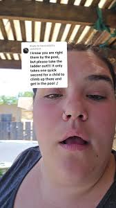 Little Boy Climbs over Pool Ladder