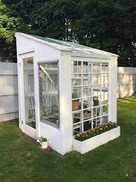 Greenhouse Made From Our Old Windows Backyard Greenhouse Greenhouse Gardening Greenhouse Plans