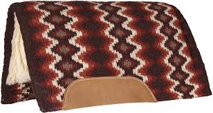 1/4″ felt on both sides of a 1/2″ pvc center to wick away moisture for a dryer back. Mustang Mohair Woven Navajo Show Saddle Pad Brown Tan Rust