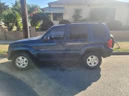 Image result for Patriot Blue 2002 Jeep