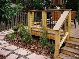 Dog proof mry deck railing from scestching ip. Dog Friendly Deck Flagstone Patio Low Maintenance Yard In Boulder Backyard Deck Designs Backyard Backyard Makeover