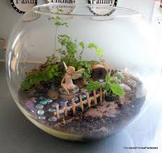 11 Inspiring Fairy Gardens Listication Part 9 Fairy Garden Diy Fairy Terrarium Halloween Fairy Garden