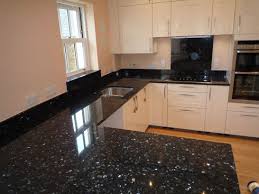 Mesmerizing Design Of Black Pearl Granite Countertops And Wooden Kitchen Cabinet Connecte Black Granite Countertops Kitchen Room Design Wooden Kitchen Cabinets