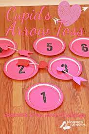 Valentine S Day Game Cupid S Arrow Toss Valentine S Day Party Games Valentines School Valentines Class Party