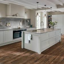 Without the wood and stainless steel island, this kitchen would feel utterly empty. Kitchen Island Ideas Kitchen Island Design Howdens