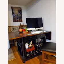 This contemporary square counter height dining table features a built in 24frosted glass lazy susan. Bob S Discount Furniture Dining Table W Wine Storage Aptdeco