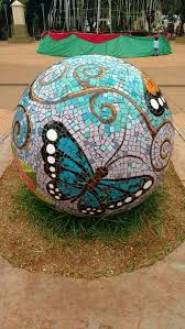 Put on latex gloves and begin smearing on the grout, packing it in every available space. 190 Mosaic Balls Ideas In 2021 Mosaic Mosaic Garden Mosaic Bowling Ball