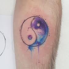 A yin yang symbol is considered as important as those of a phoenix or a dragon. 10 Spectacular Watercolor Galaxy Tattoos Galaxy Tattoo Watercolor Galaxy Tattoo Cute Tattoos