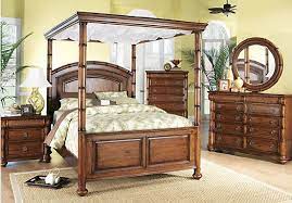 Shop For A Cindy Crawford Home Key West Dark Pine Canopy 6 Pc King Bedroom At Rooms To Go Find Bedroom Furniture Sets Rooms To Go Furniture Bedroom Sets Queen