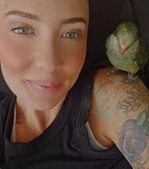 All I have to say is spend alot of time with him out of the cage alot they  are 4 or 5 year's toddlers so it's like keeping a kid caged up