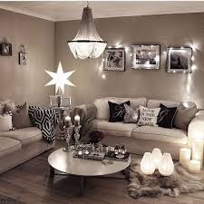 Deep blacks complement warm whites with gold accents to create a glamorous scheme. Nea Sorvisto Ig Nea Sorvisto Silver Living Room Taupe Living Room Black And Silver Living Room