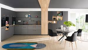 Ilot central de cuisine avec un plan de travail en quartz. Des Exemples D Amenagements Pour Votre Cuisine Equipee Mobalpa