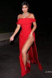 The formfitting glittery red dress comes with a sequin detailing material, full sleeves and a turtleneck. Kylie Jenner Inspired Red Off The Shoulder Celebrity Formal Prom Dress Oscars 2020 Party