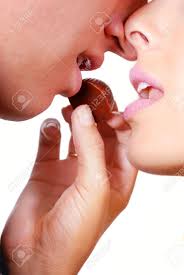 When i got there i had a quick look around and saw that his bedroom door was open and his girlfriend (25). Young Woman Feeds A Chocolate Candy To Her Boyfriend Stock Photo Picture And Royalty Free Image Image 5760569