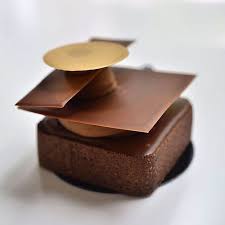 Valrhona Chocolate And Hazelnut Tart For My New Bakery And Bistro Bachour Bb Photo By Gourmandj Chefsroll Bachour Bachourchocolate Bachourchocolatebook B Valrhona Chocolate Chocolate Chocolate Delight