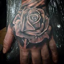 Trending tattoo ideas and designs for men and women. 75 Black And White Tattoos For Men Masculine Ink Designs Rose Tattoos For Men Hand Tattoos For Guys Rose Hand Tattoo