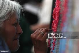 Julie Patnode sells eclipse-themed t-shirts to tourists