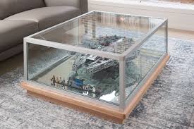 This glass display coffee table is custom built in the shape of a small boat. Custom Fitted Timber And Glass Coffee Table With Lego Display Custommadefurniture Cmfurnituredesign Cust Coffee Table Custom Made Furniture Furniture Making