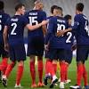 Cristiano ronaldo and karim benzema scored two goals each as the points were shared in budapest. 1