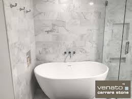 When tiling whole walls stick to a pale grout to prevent the space closing in. Carrara Venato Marble Honed 6x12 Subway Floor And Wall Tile