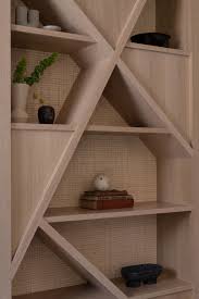 Maybe you would like to learn more about one of these? Creative Shelving Shapes Were Designed For This Living Room Wall That Also Includes A Tv Fireplace And A Pair Of Window Seats