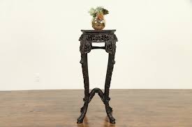 It has oriental accent around the apron and the legs. Sold Chinese Antique Rosewood Plant Stand Or Sculpture Pedestal Marble 32003 Harp Gallery Antiques Furniture