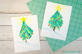Check out our watercolor christmas selection for the very best in unique or custom, handmade pieces from our shops. How To Paint An Easy Watercolor Christmas Tree Projects With Kids