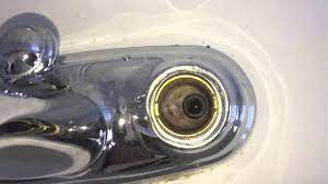 Two cylindrical cups and two teaspoons made out porcelain. How To Change The Stems Seats And Springs In A Delta Faucet Youtube