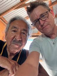 Chief Arvol Wilfred Looking Horse “Sacred Horse”, Lakota Sioux, signing my  cabinet card that I gifted to Marcie Sinclair this last week. I feel so  fortunate to have the honor of taking