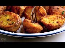Make Perfectly Roasted Potatoes At Home With Or Without Oven Roasted Potato Recipes Potatoes Roasted Potatoes