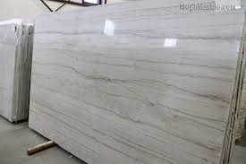 If you're considering quartzite for your kitchen countertops, you're probably wondering how it compares to the other materials available. White Quartzite Countertops Kitchen Countertops Ny