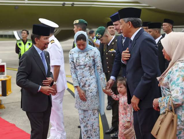 The Sultan of Brunei, Hassanal Bolkiah, attending a formal royal ceremony.