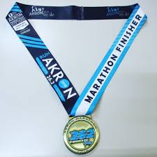 How do we do it? Akron Marathon On Twitter Medals Revealed Oh Yeah Runakron Runakronohyeah