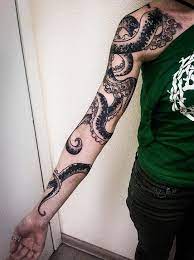 This design was inspired by domenichino's 'the maiden and the 14. Black Octopus Tattoo On The Right Arm Black Octopus Tattoo On The Right Arm Arm Black Const Octopus Tattoo Sleeve Octopus Tattoo Octopus Tattoo Design