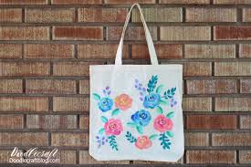 Add a small amount into a container. Watercolor Floral Painted Tote Bag Diy
