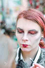 Spolowich's board gothic vampires on pinterest. Full Length Of Attractive Young Woman With Gothic Vampire Makeup On Helloween Party Halloween Make Up Face Stock Photo Picture And Royalty Free Image Image 74143467