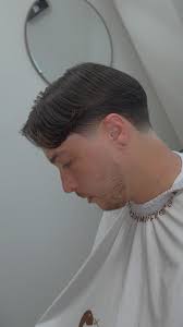 Taper fade blended up into a curtain fringe, • Styled with Glacial Clay  Pomade from @highlandstyleco 🌱 , • Use code ‘KUTS’ for 20% off highland  products, BOOK NOW in Stamford, CT , • Click the link in ...