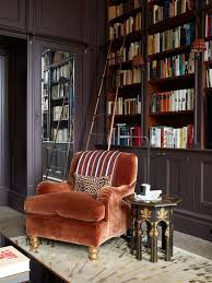 Deep Purple Library Dreams Rust Colored Velvet Chair And Middle Eastern Inspired Side Table Cozy Home Library Home Library Design Cozy House