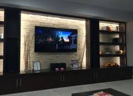 Entertainment walls have become an important living room feature, and now provide stiff competition for the traditional feature fireplace. Incredible Tv Wall Design And Decoration Ideas You Need To See Engineering Basic Basement Living Rooms Basement Design Tv Wall Design